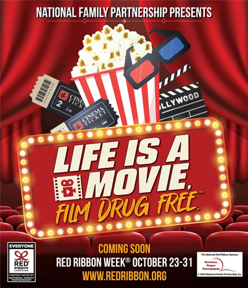 Red and white popcorn bucket that states life is a movie. film drug free.