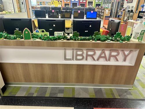 St. Patrick's Day decorations on library ledge 